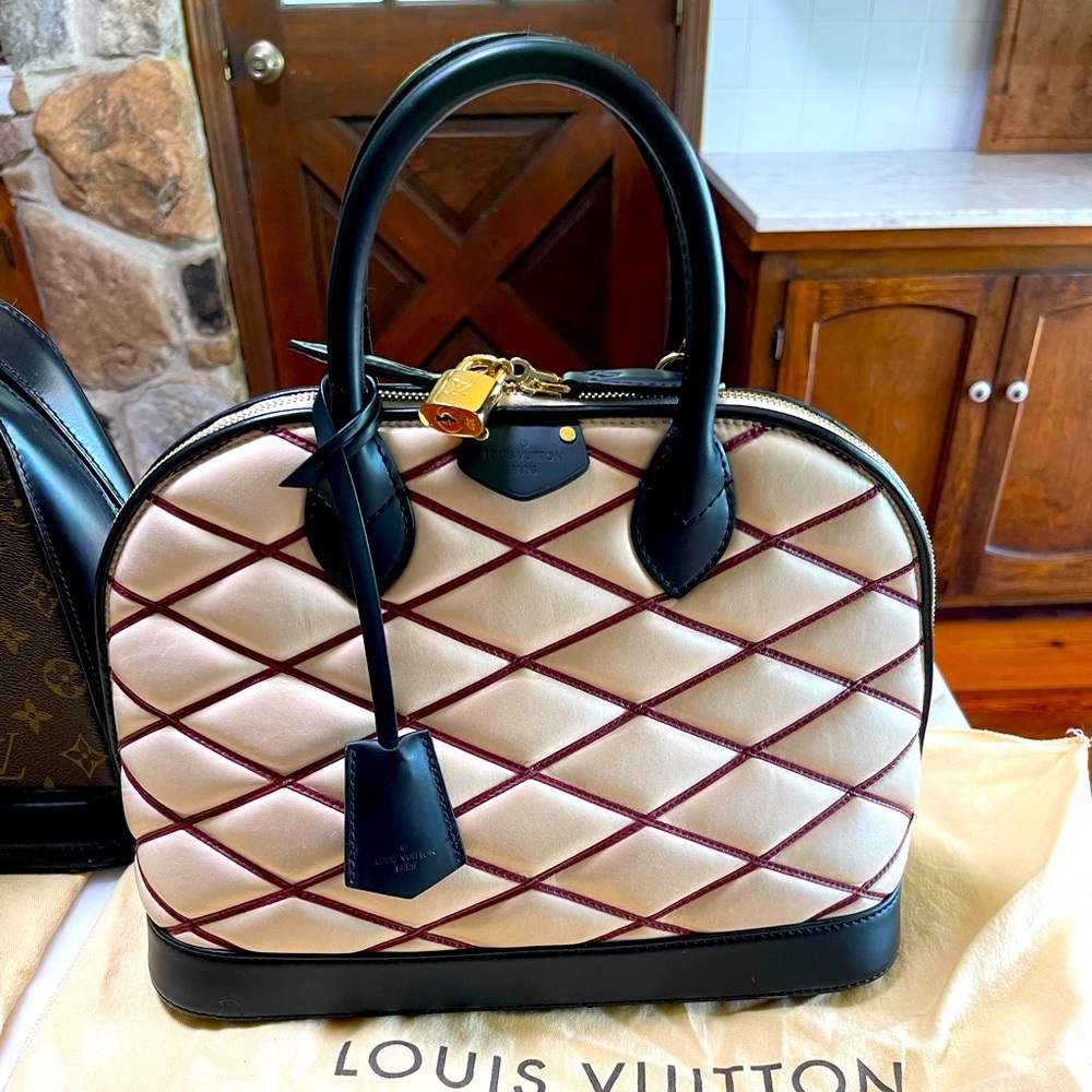Louis Vuitton Lamb skin bag.